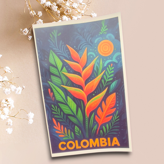 Libreta ilustrada con heliconia naranja, hojas verdes y texto Colombia